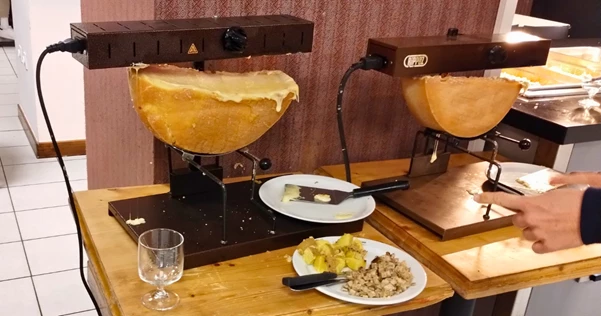 Traditional Raclette meal served at UCPA Les Contamines